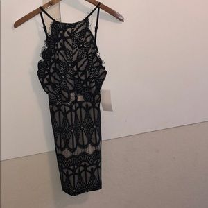 Chic beige black lace dress